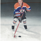 Cam playing hockey, his childhood passion, between gaming.